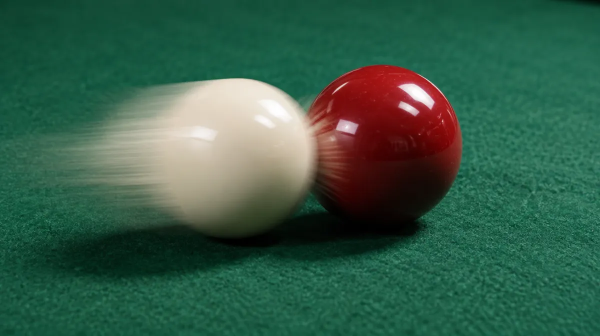 Two billiard balls colliding on a green table in crisp light
